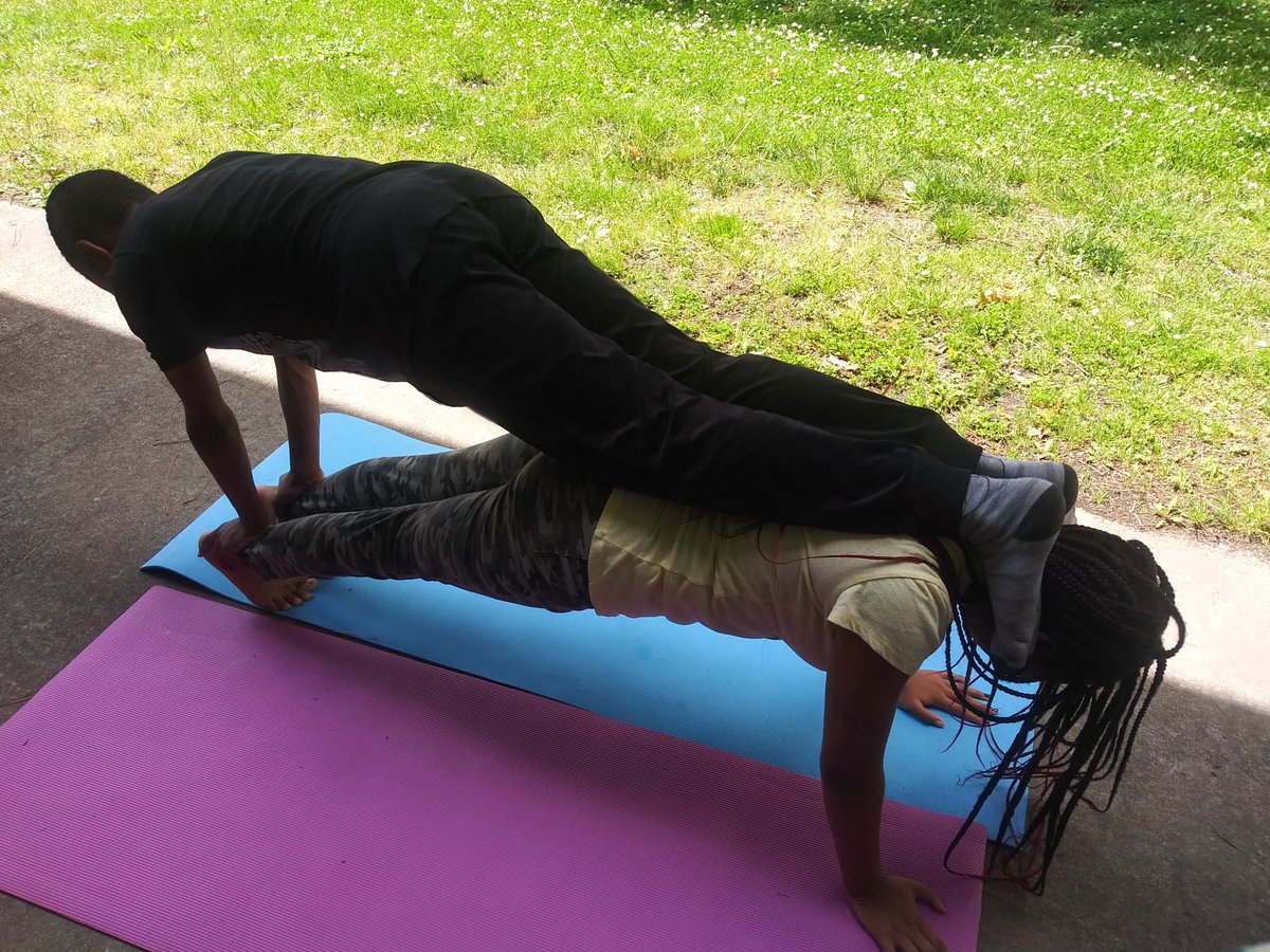 StayRealLuvLife's tweet photo. Got these PAWesome pictures, w/ permission from mom, I wanted to share these two are showing of their partner yoga! This week, students had a PE Choice Board w/ various physical activities to complete! @OscarSmithMS @CoachWard23 @cps_pe @BrayTreyton https://t.co/oH6lCMH7F5