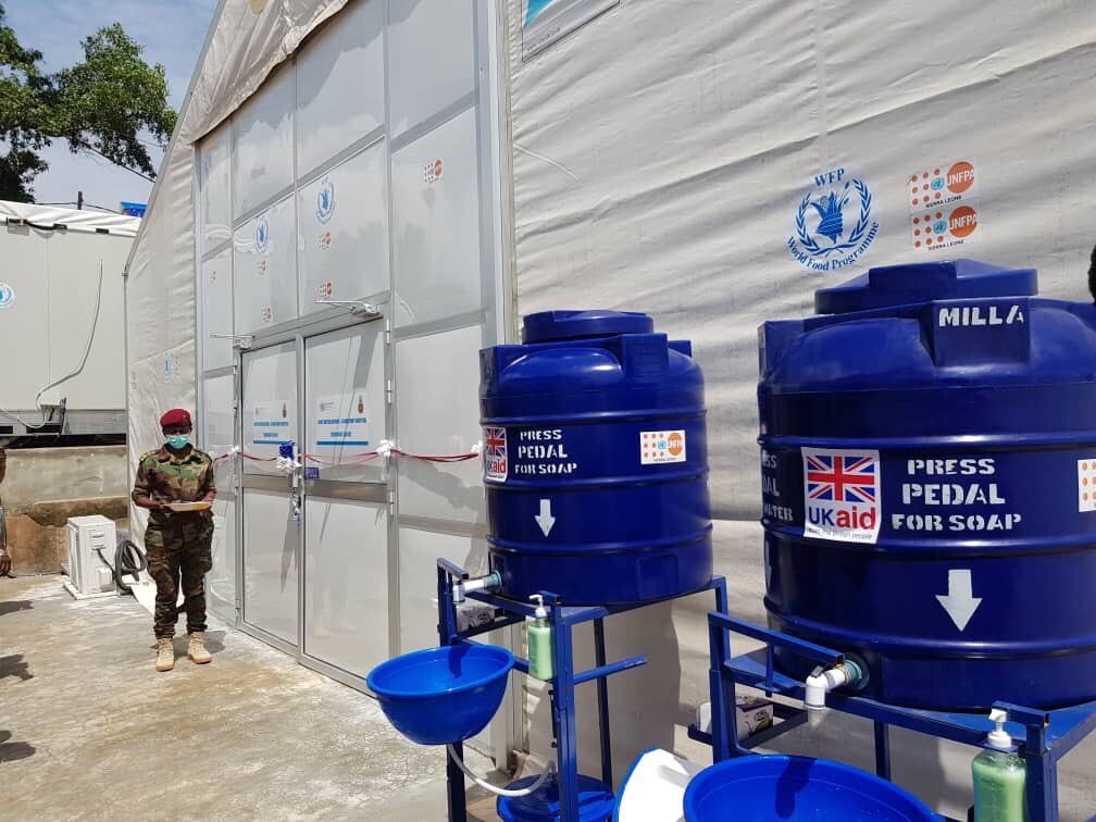 UKinSierraLeone's tweet photo. #UKaid has helped establish the treatment centre at Military 34 hospital which will play a central role in the fight against coronavirus.  The UK stands with #SierraLeone.  @DFID_UK @smustardbhc @KobiBentley @UNFPASierraleon https://t.co/HhmQeedGPe