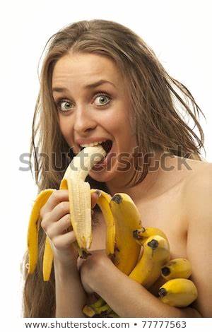 (6/10)There's a very Italian feel to this one... Her laughing eyes seem to yell "Mangia! Mangia!", which means "Eat! Eat!". Whilst her banana hoarding is a bit greedy, the casualness is offset by her clear joy in getting as many healthy bananas into herself as possible.
