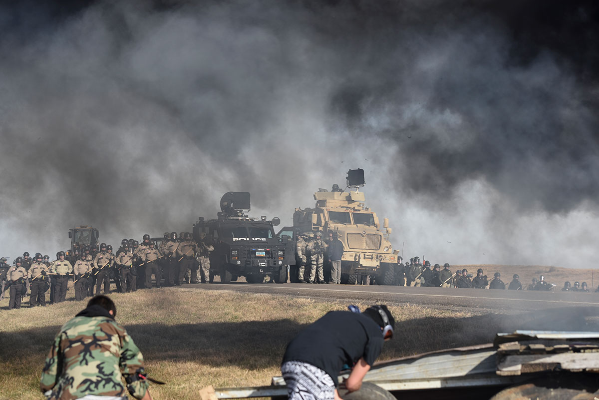 Authorities were using tear gas, rubber bullets, and water sprays on protesters who allegedly assaulted officers. in the medic tent, I saw my brother come in and he got shot with a bullet it was so scary. 17 people had to go to the hospital.