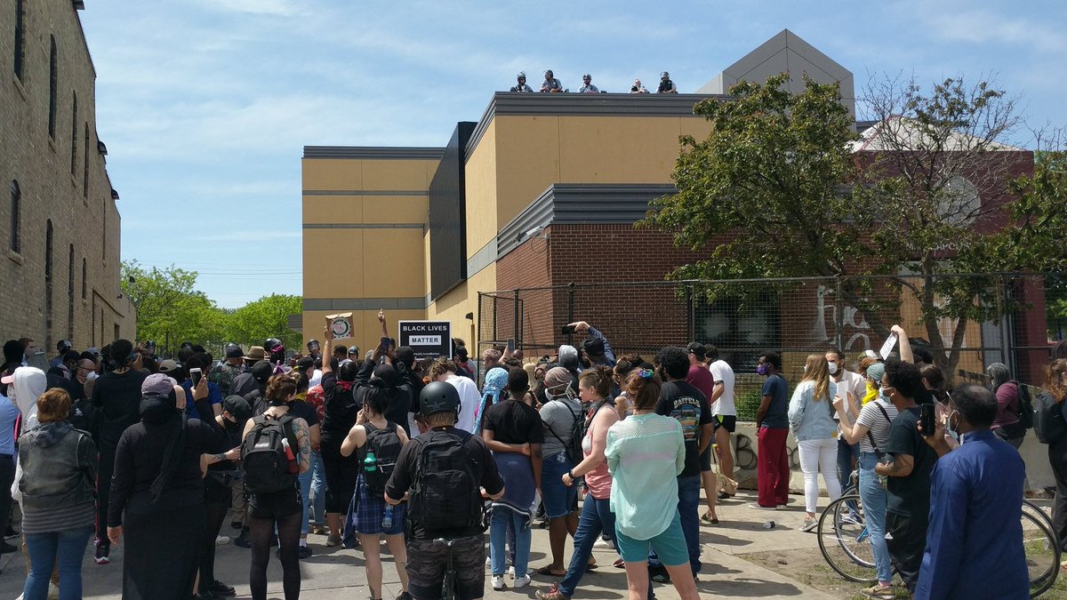 For those asking where the cops are, they are across the street protecting the 3rd precinct police building from a large crowd that's right outside.