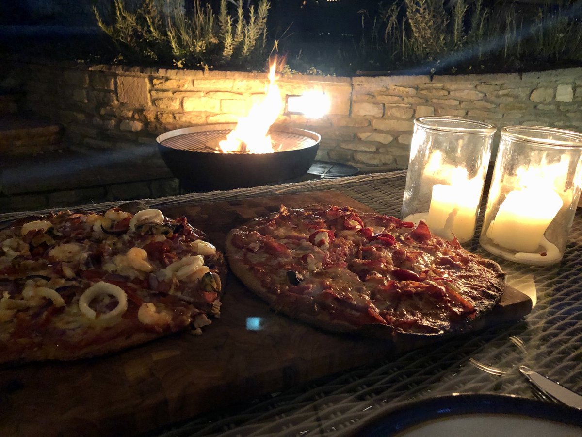 Homemade pizzas in the garden with Human League playing #perfect #kadai #firepit