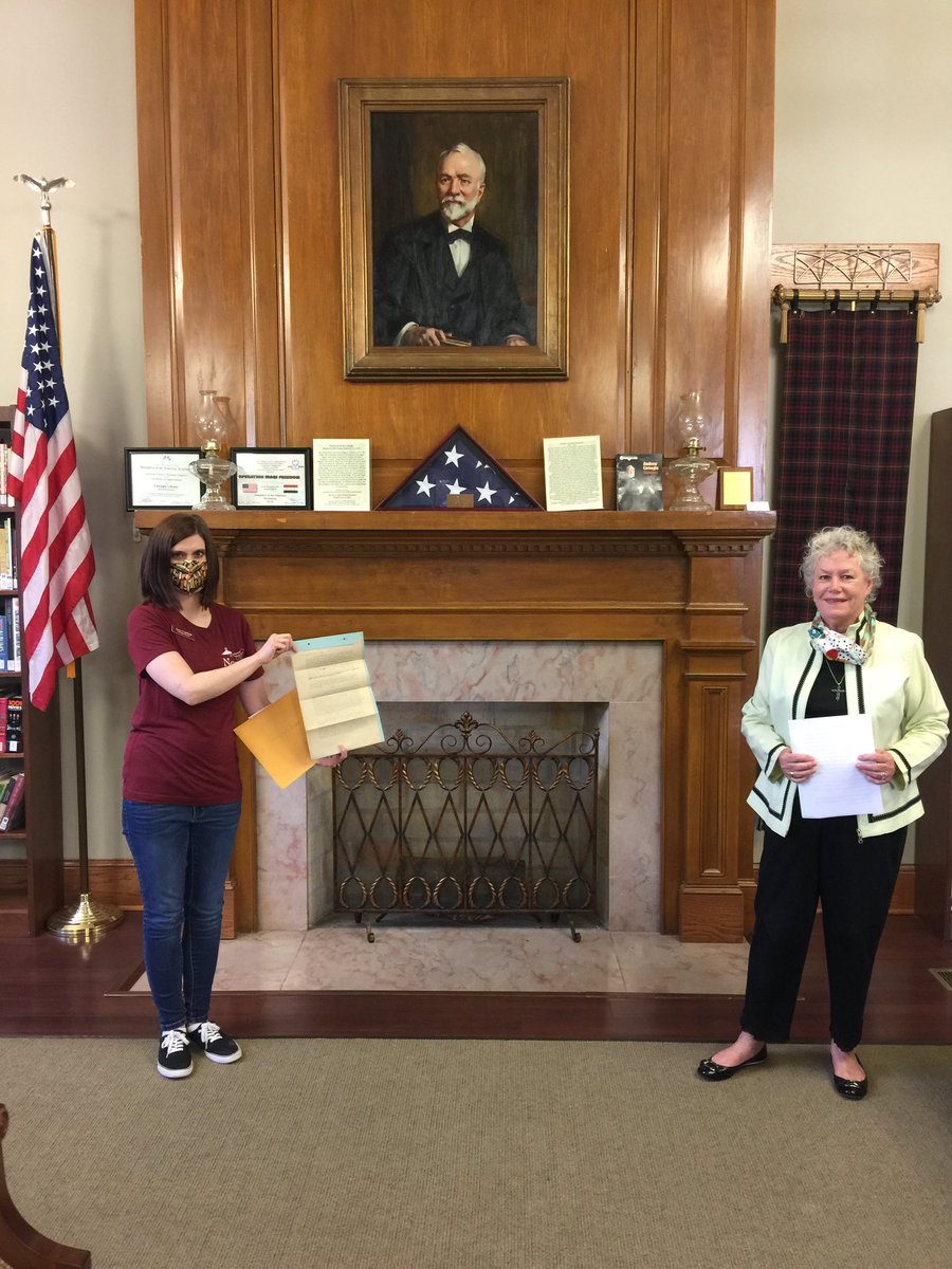 LynnSmithGA's tweet photo. Presented Susan Crutchfield, Director of @newnancarnegie, with several Carnegie Library historic documents. She is holding the original January 14, 1926 Covenant &amp; Agreement between Mrs. B. T. Thompson, Mrs. Lucile T. Jones, and the Trustees of the Carnegie Library. https://t.co/rsBlSrv0Qh