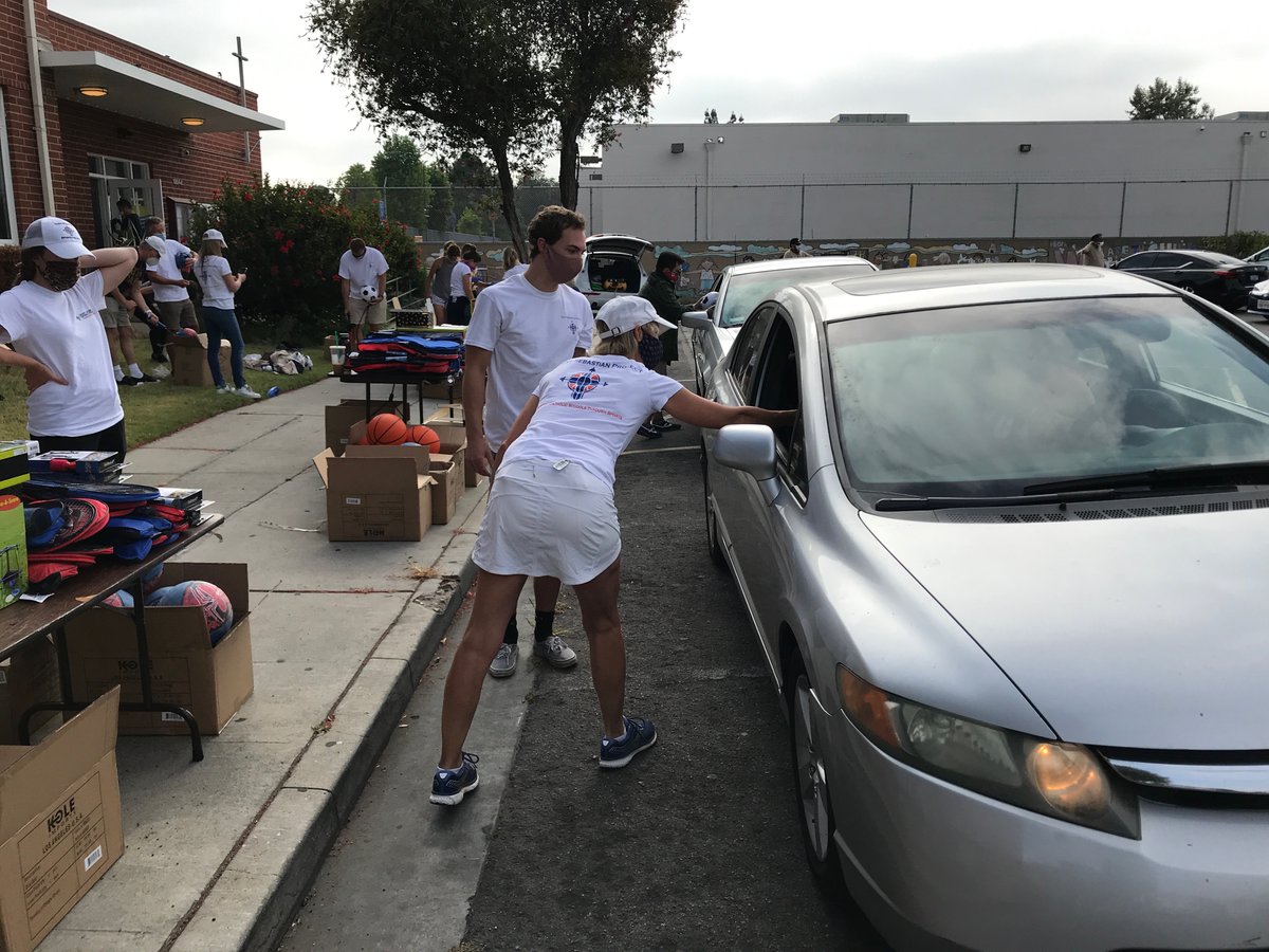 PlayEquityFund's tweet photo. Having a ball with new friends &amp; families! We expanded the #StayActiveStayStrong program by partnering with Los Angeles Archdiocese school meal centers, distributing sports gear today at seven schools to support #PlayAtHome! #PlayEquityFund https://t.co/hliZTfYG4G
