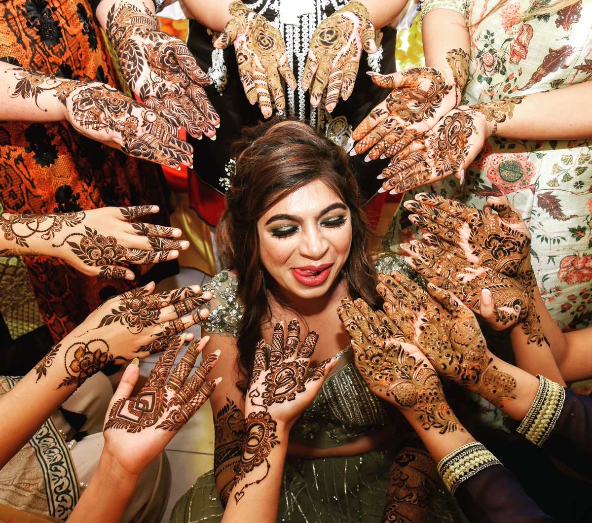 HERE COMES THE BRIDE... Join the mehendi party by painting your hands green and the town red.
A smile happens in a flash, it's memories last a lifetime.
 #mumbaiweddings #weddingtrends #weddingbiz #weddingvibes #weddingplanner #weddinggoals #photograpy #weddingphotography