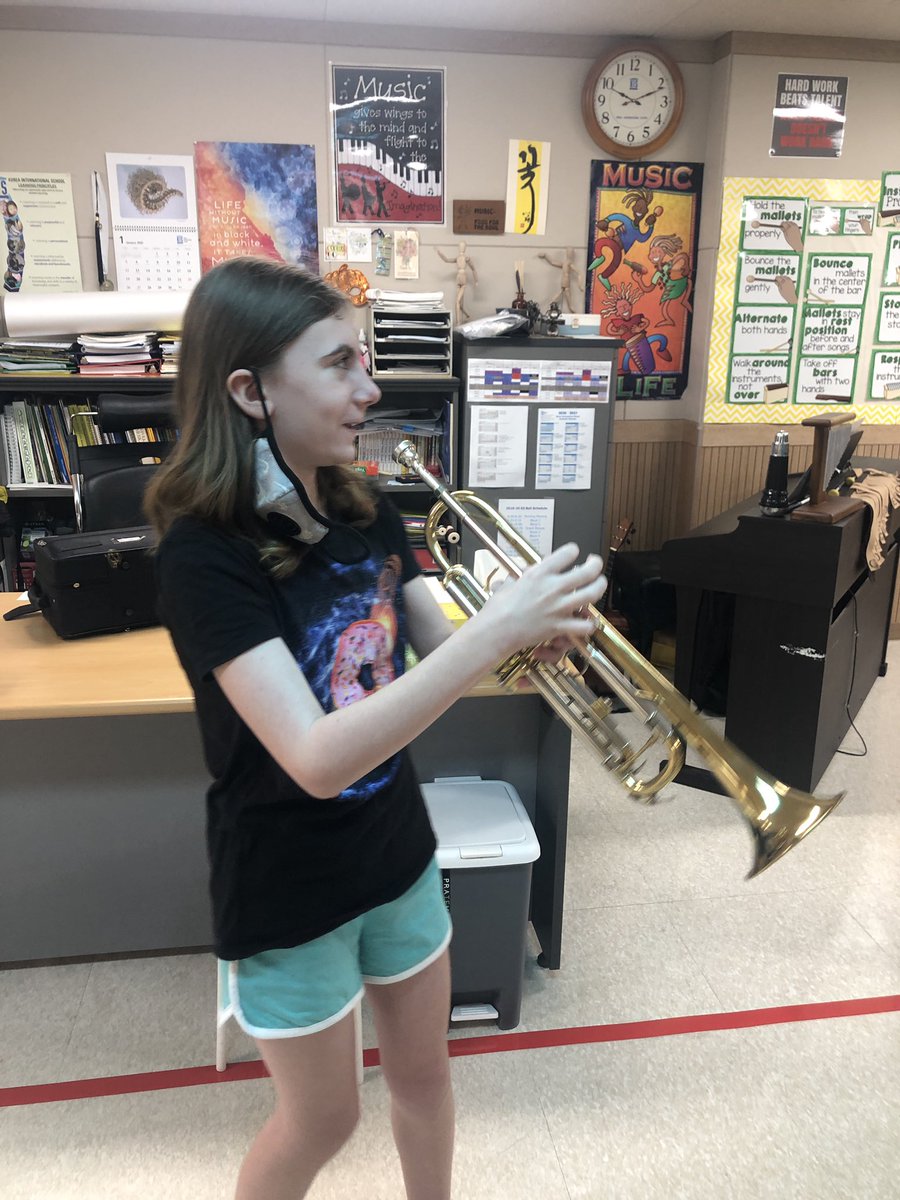 Hanging out with ES music teacher extrodinare @musicalmrwoods as he introduces my daughter to the trumpet. She starts band next year. Glad to be back on campus for in person work. @kispride #musiceducation #ReopeningSchools