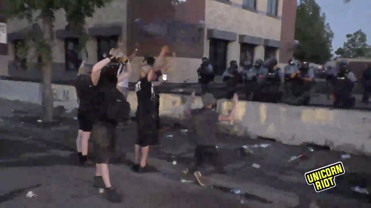 theagathion's tweet photo. Cops are shooting 40 mm rounds while protestors have their hands up. You can hear them shooting and hitting things despite the risk of accidentally hitting peaceful protestors. #poortraining #minneapolisriots #GeorgeFloyd #icantbreathe https://t.co/ao4MrPDul8