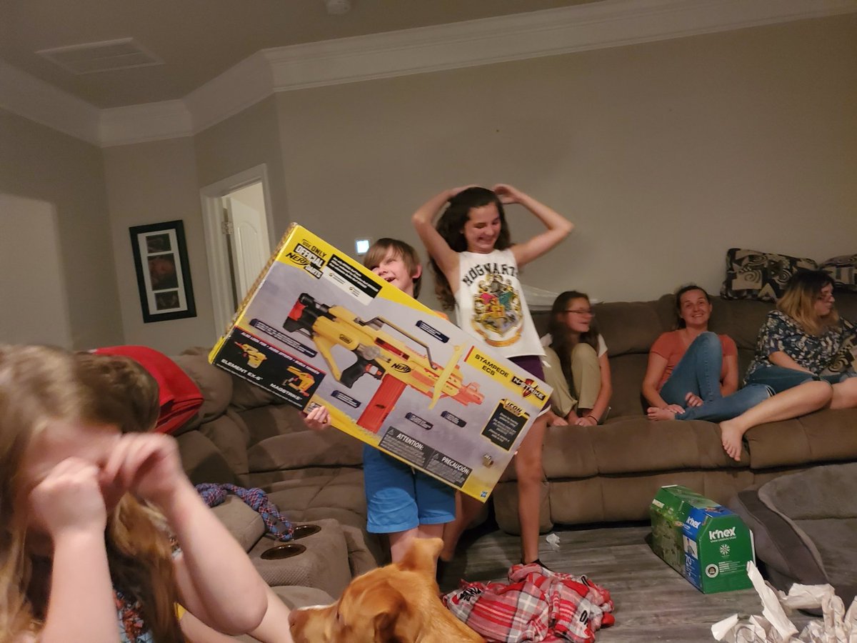 Here I am...Watching my son enjoy his 10th birthday with all his siblings, his mother, and all the extended family childrenand yes, that is  @marcusjcarey's "Think to Code" book as the first present he opened. He eventually made it to the weaponry