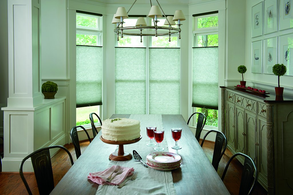 Our newest collection of cellular shades in designer colors and fabrics turn a plain jane dining room into a beautiful gathering space. bit.ly/2IGbX8i