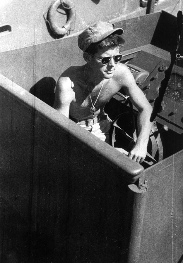 John F. Kennedy, born on this date in 1917, was the last commander of PT109, a patrol torpedo boat during WW II. Kennedy saved his surviving crew after it sank. This incident may have contributed to his long-term back problems. Photo in the public domain.  #OTD  #JFKGuterman