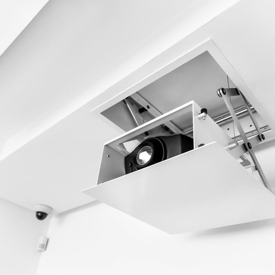 Hausba's tweet photo. With HAUSBA’s Boardroom Automation, powerful AV systems help deliver compelling narratives to your clients and business partners.

And with the touch of a button, your projector hides away in-ceiling, leaving behind a minimalist modern boardroom.

#HausbaExperience #audiovisual https://t.co/ke7ZeJ5nTH