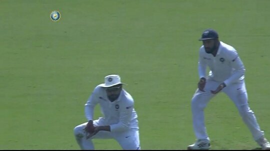 And what happens next ?Rohit again receives a catch in slip of Mahmadullah , Shami bowling ,very soon after the lunch break is over.And this time he catches itYes there are smiles all over & Rohit Sharma points the fielding coach. here is the reaction of fielding coach.