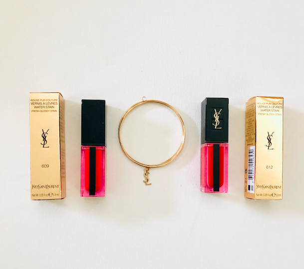 davelackie's tweet photo. I'm giving away this pair of YSL Vernis A Levres Water Stain Fresh Glossy Stains in Rouge Déluge &amp; Submerged Coral + a YSL charm bracelet. To enter, follow @davelackie &amp; @NinaWestbury &amp; RT https://t.co/oaOoeQYw2Y