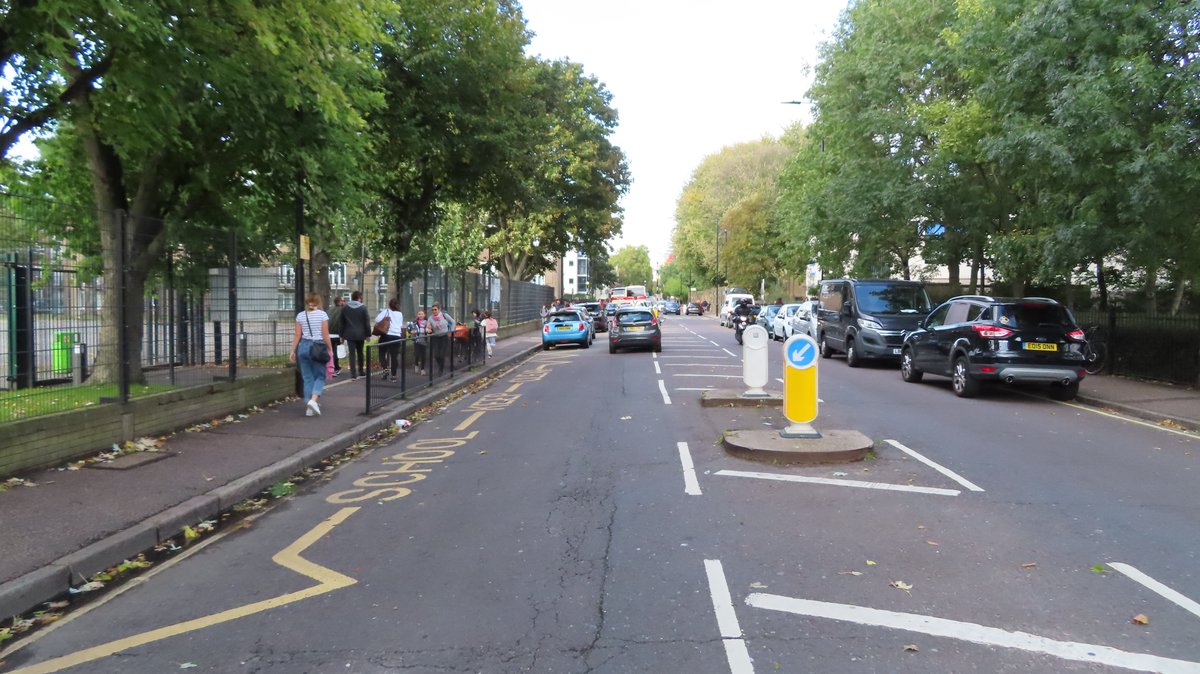 Before and after the transformation of Queensbridge Road in Hackney. Many car park spaces removed to create safe space for families to cycle