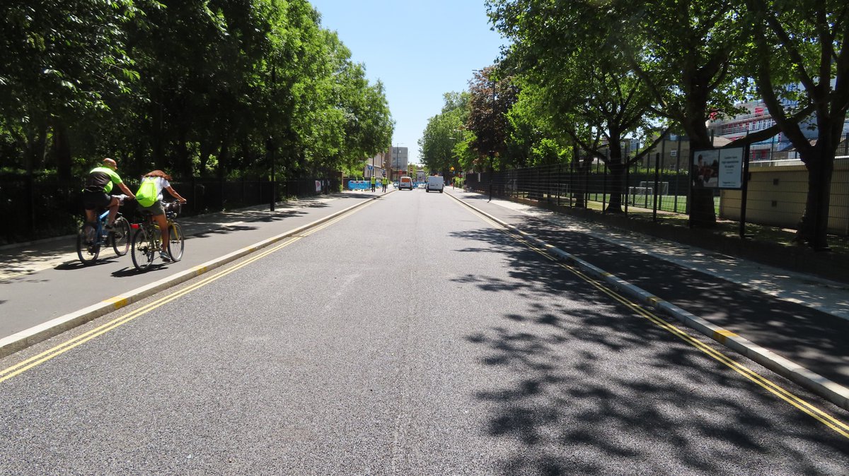 Cycle tracks are wide enough for comfortable side by side riding. Perhaps even three abreast. Or for carrying a ladder