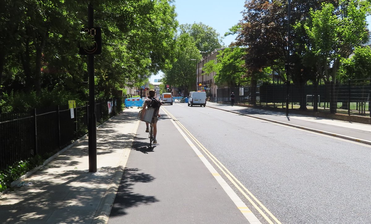Cycle tracks are wide enough for comfortable side by side riding. Perhaps even three abreast. Or for carrying a ladder