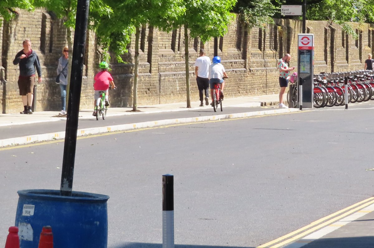 Also the very first thing I saw when I got there was this parent and their cycling on the footway on the Whiston Road "Quietway" before using the cycle track on Queensbridge road. I don't blame them - it was packed with motor traffic, like it always is!