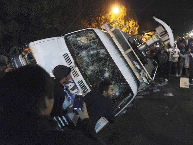This riot cause $190,000 worth of property damages which include destroying the local news satellite van, uprooting street signs and lamps and of course attacking the police. The thugs also looted the fucking streets.