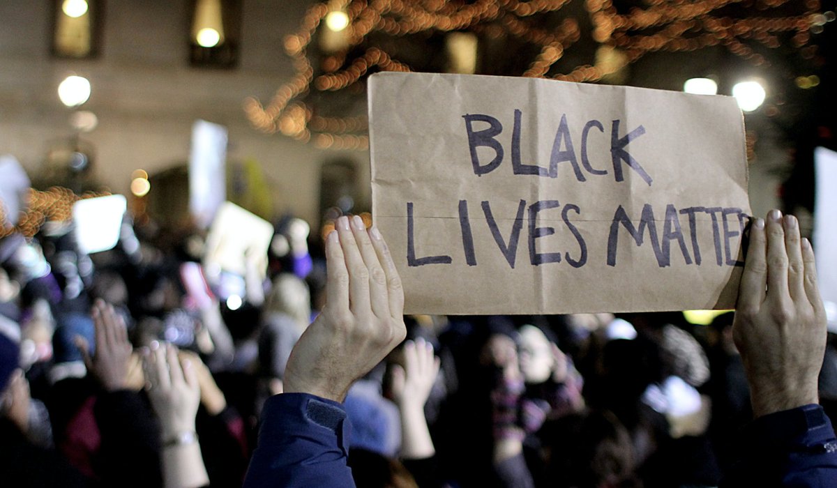 Image from a protest. The only visible sign says "Black Lives Matter."