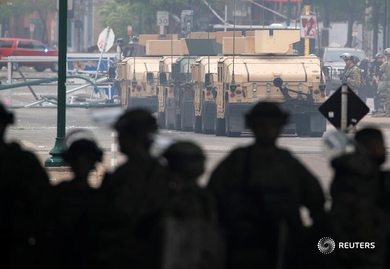 National Guard members and armored vehicles are seen in the area after a third night of protests against the police killing of George Floyd. More images from Minneapolis:  https://reut.rs/3gyZZQa    @ReutersBarria