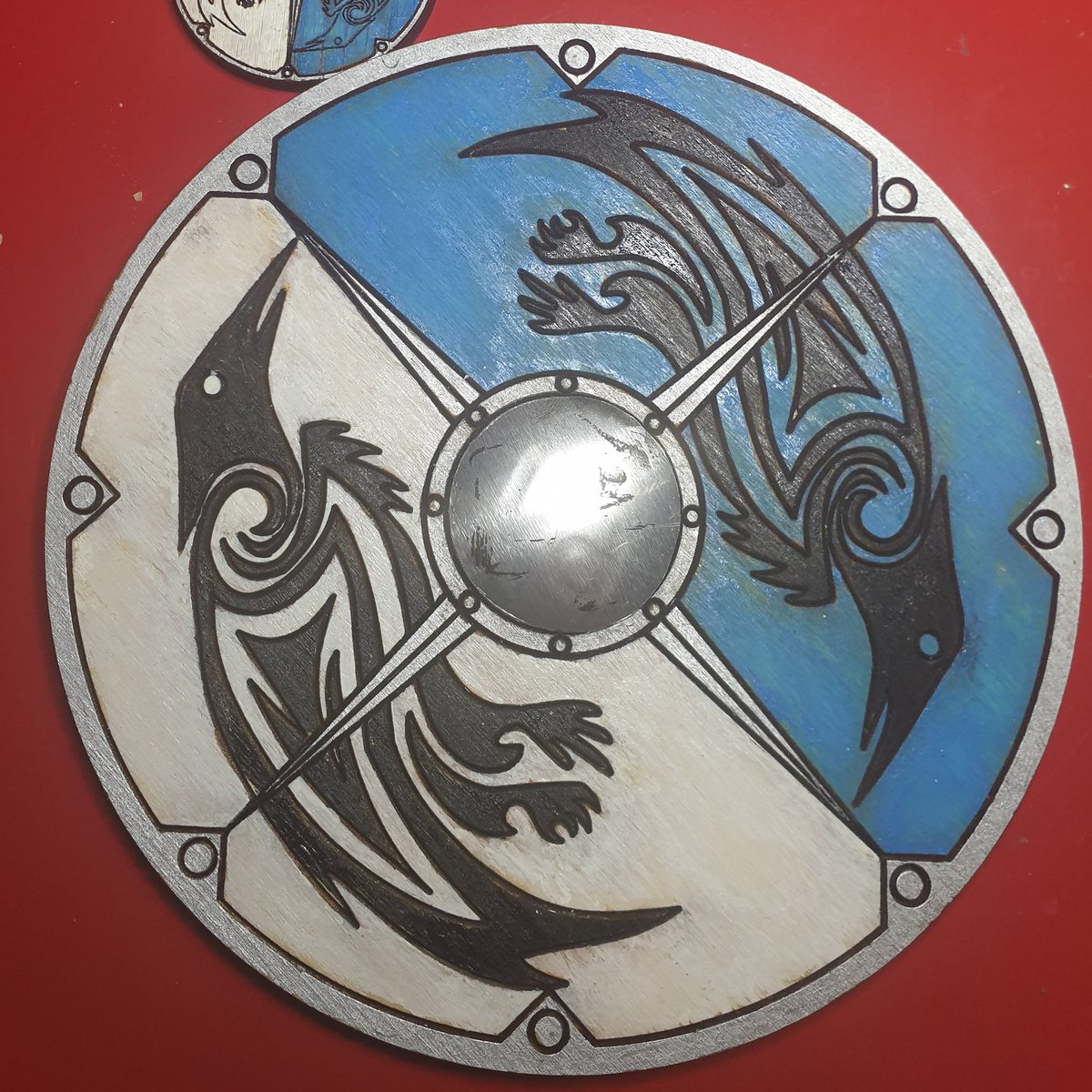 This week @foxybadgercosplay released a clean version of one of the shields seen in the AC:Vallhalla trailer and I just had to give lasering it a shot! 5mm ply with a soda can boss, painted with oil paint pens! 
#ParalianLaser #laserengraved #lasercut #uk