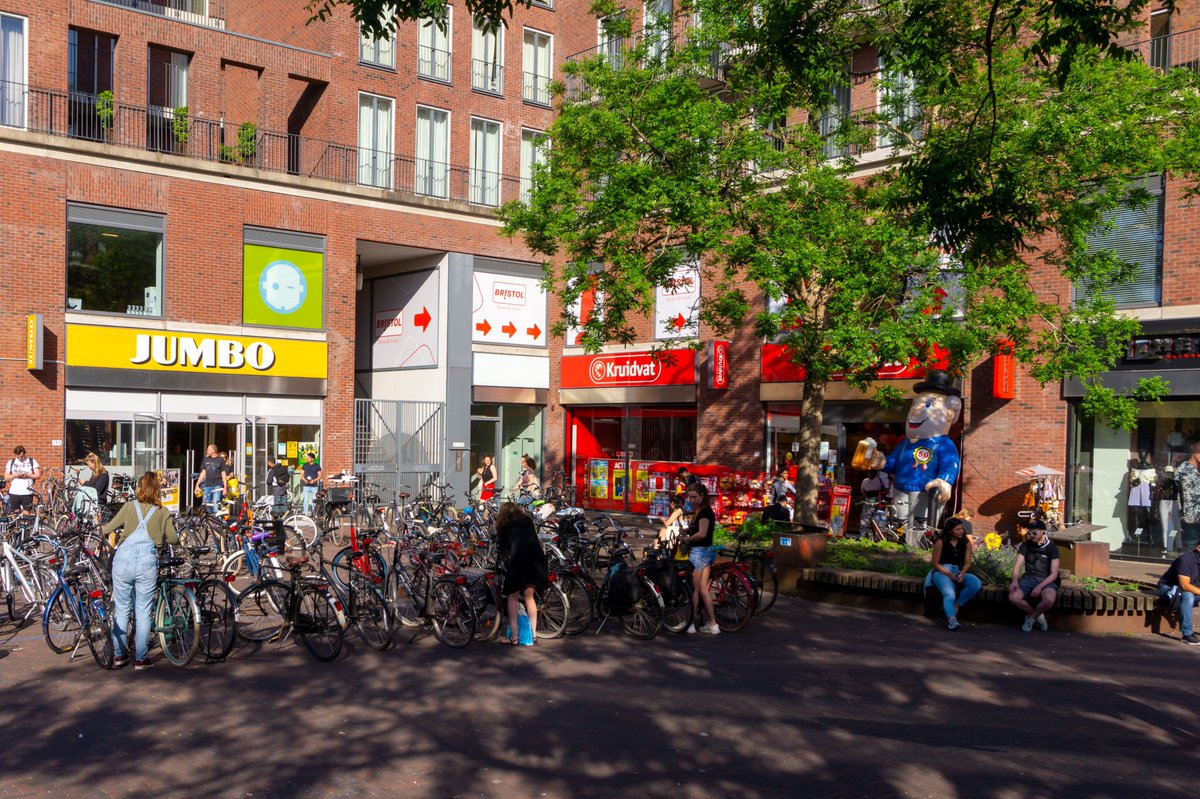 Some in the Netherlands are complaining about the mess cycling parking creates outside shops. I see it differently. Look at this image: It's not a messy square, but a human- and environment-friendly parking lot. I'd never replace it with a car parking lot.