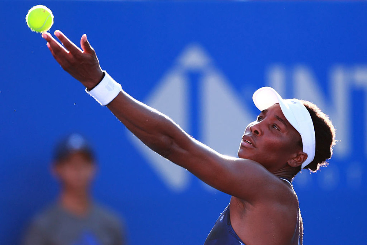 Venus Williams preparing to serve the ball
