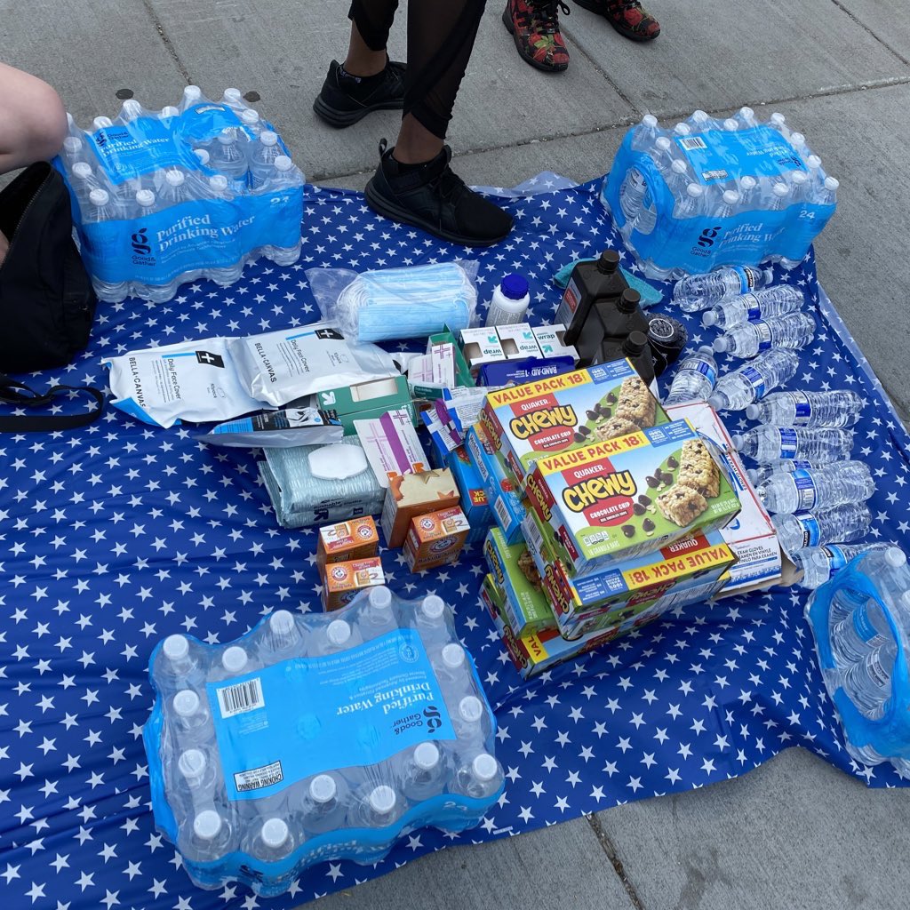 The group is prepared with face masks, water bottles, granola bars, and standard first aid gear like bandages and hydrogen peroxide  #GeorgeFloydprotest