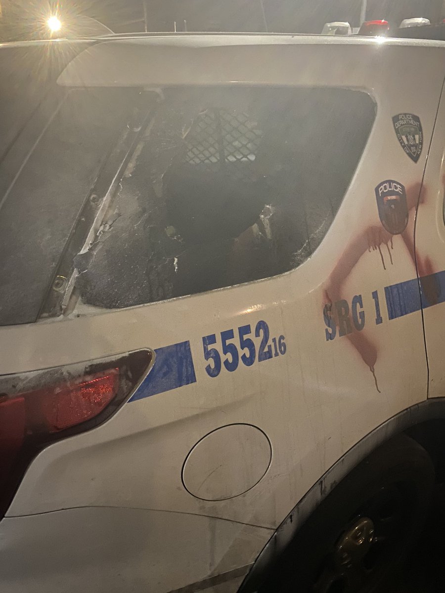Saw two police cars with FTP (fuck the police) spray painted. One had a window kicked in. Another has both its mirrors ripped off. But police were close when this was happening, police had pulled back and did not interfer.