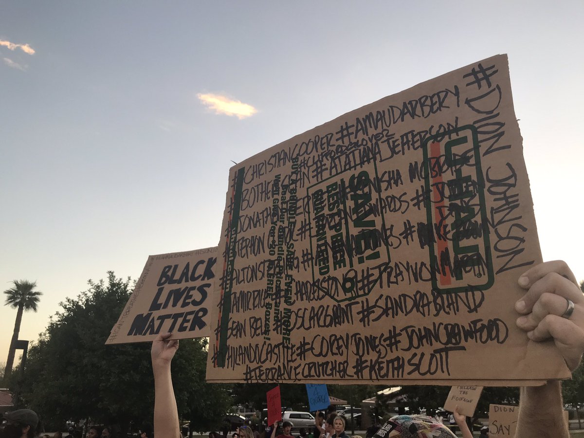 More of the signs being displayed here at Eastlake Park at a protest in memory of Dion Johnson, who was fatally shot by  @Arizona_DPS earlier this week.  @azcentral