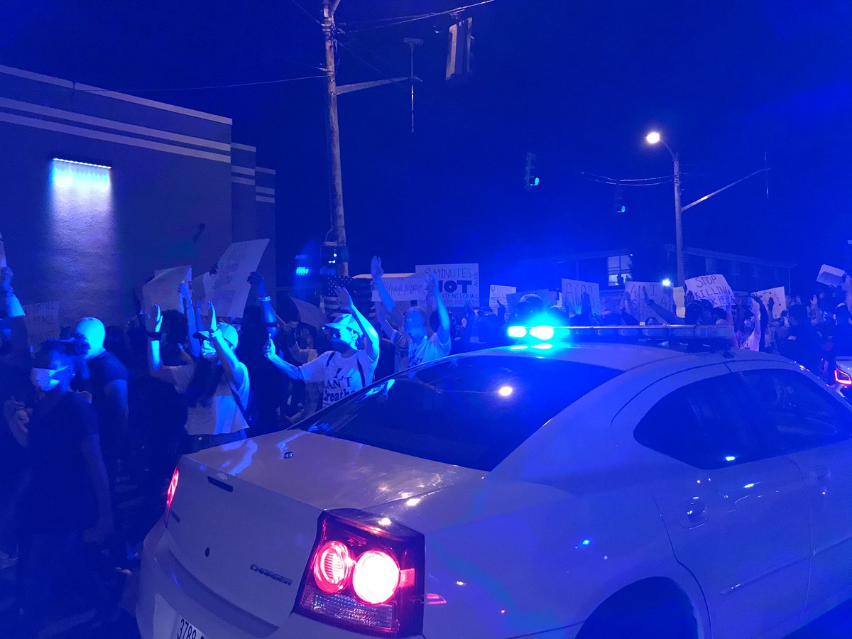 “Hands up, don’t shoot,” the demonstration chanted as it turned back west, up Vance Ave.This is blocks from the Lorraine Motel.