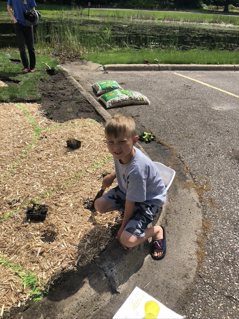 ASkauge's tweet photo. Fun to get to take the Prairie Plants my Ss grew from seed at WW and plant them at Northtown Library! Such a great partnership with Coon Creek WD, @AnokaCoLibrary and @GrowGreenHearts to build community and grow EnviroSTEM Lit.#SLPPantherProud#GrowingGreenHearts#ACLGoesGreen https://t.co/10tliPC7XF