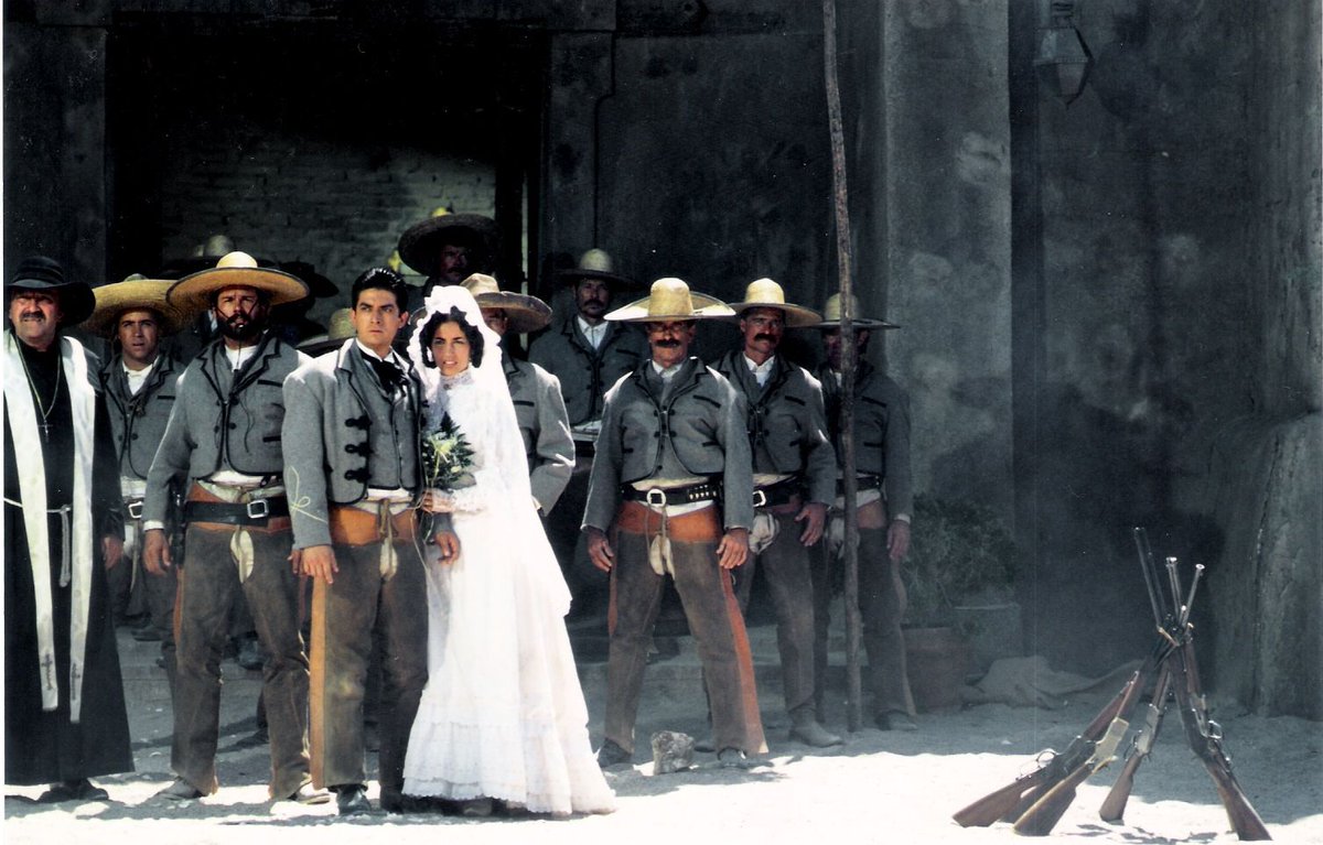 When it comes to authentic costuming in a Western, Tombstone stands out as one of the better examples, and yet some of the choices made still baffle me. For example, would the groomsmen at a Rurale wedding all wear matching chaps? Are they afraid of thorny bushes in church?