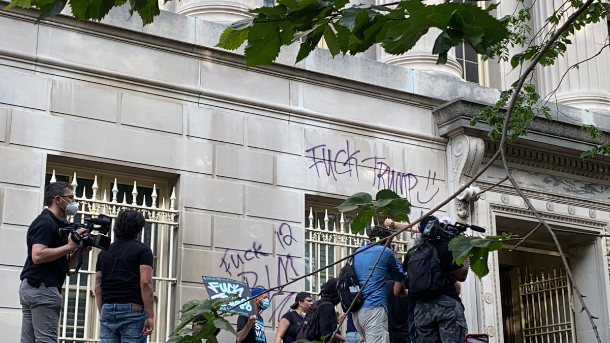 Someone has graffitied Fuck Trump on the Freedman’s Bank Building where the protestor was taken by police