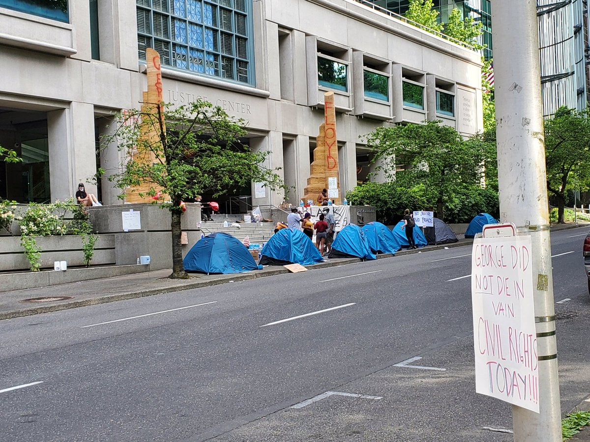 I am here in Downtown Portland, where activists have occupied the steps of the Justice Center in solidarity with protesters in Minneapolis and around the nation. We are about 30 minutes out from the official start of today's event.I am told police are suiting up nearby.