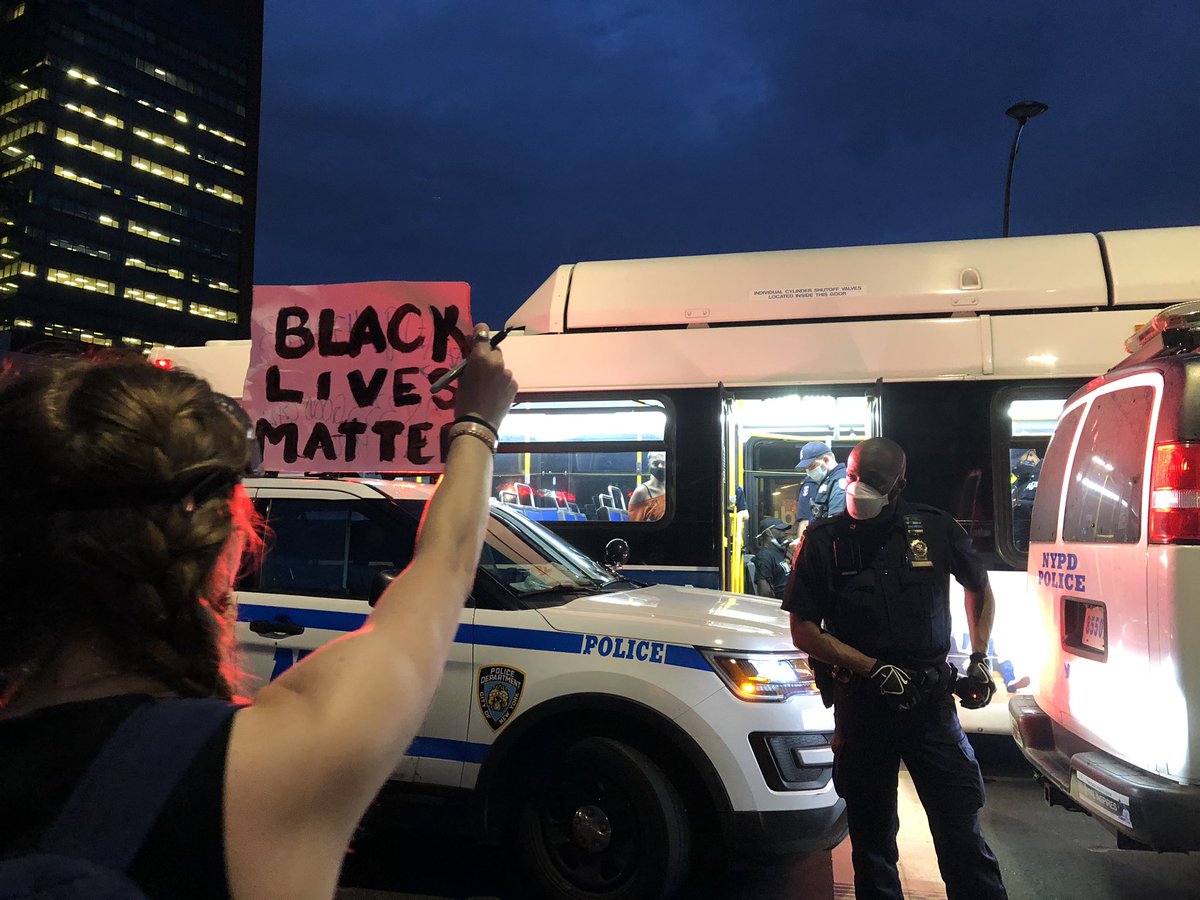 protesters arrested are put on MTA bus on Flatbush ave.