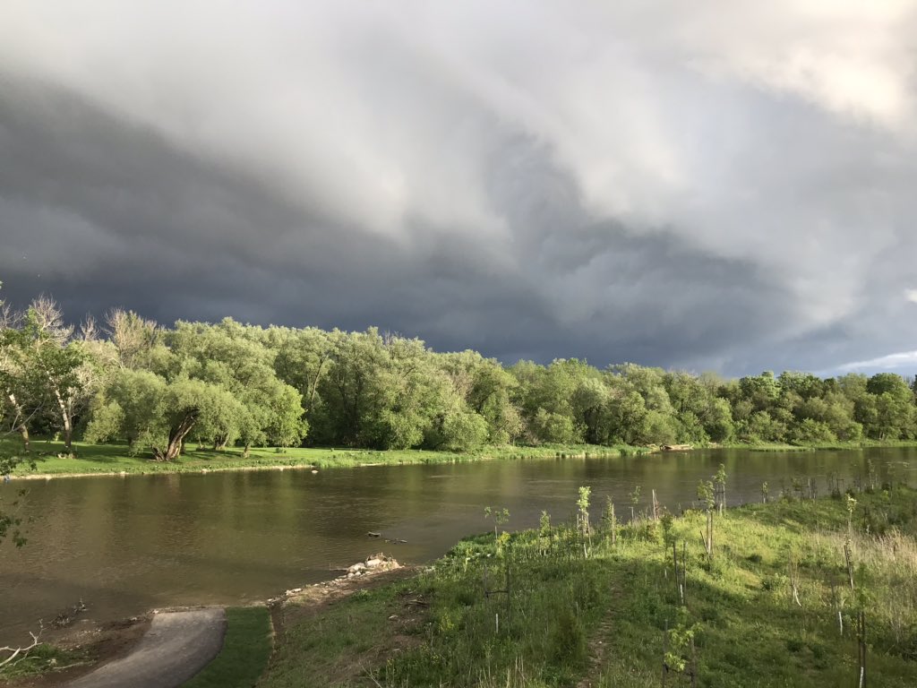 HabtroutBrian's tweet photo. The back light from the sun gives the departing clouds a much more ominous look then they really were as I walked along the Grand River in Kitchener getting in over 12000 steps for the #BCSCstepchallenge @KMacTWN @weathernetwork https://t.co/BIOwixaj7C