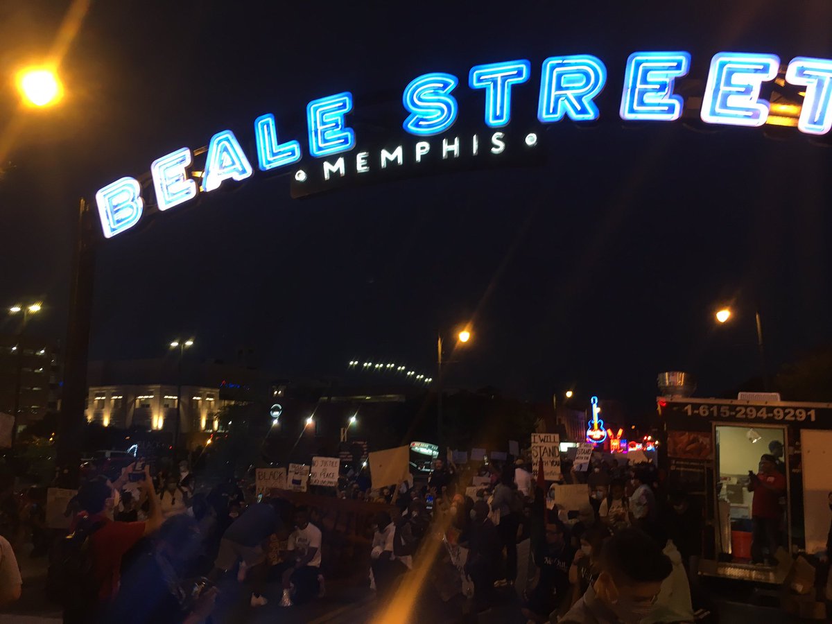 This is the second collective kneel of the evening, at the intersection of Beale and Main.