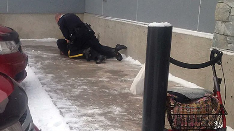 And here's a new thread, with another story in the news this week.In 2014, a photo came out of an RCMP officer on top of a 61-year-old Wet'suwet'en elder in Smithers, west of Prince George. Here it is.