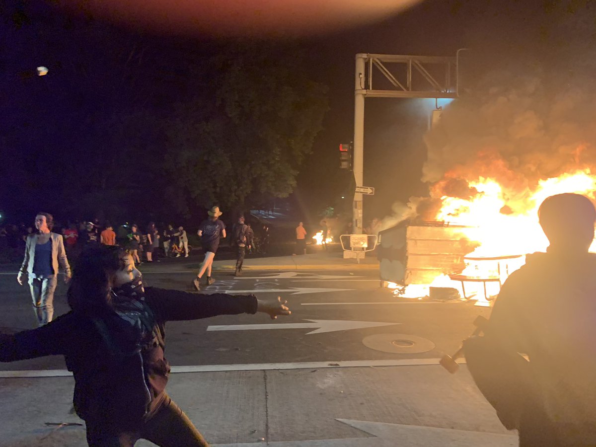 Flame in downtown Eugene is massive now. Three dumpsters, several dining tables from surrounding restaurants, etc. Too hot to stand even remotely close to.