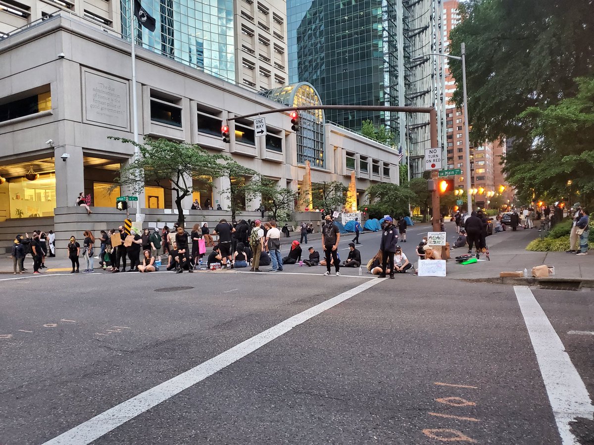 I am back at the Justice Center, where the crowd occupying its steps and the road out front has only grown. The mood is high here tonight. Broadly peaceful to everyone but the Police, who I have seen very little evidence of.