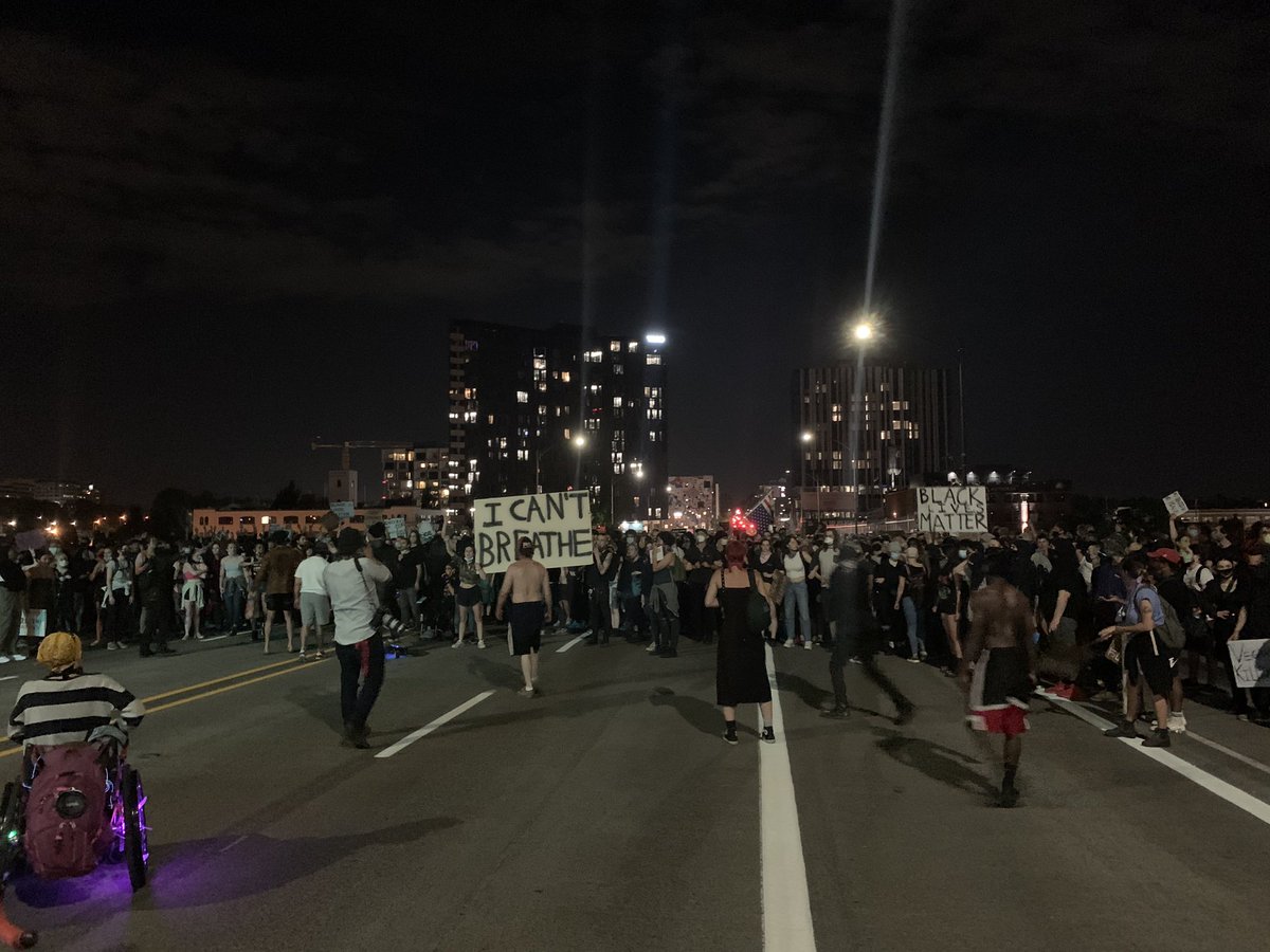 On the bridge, holding