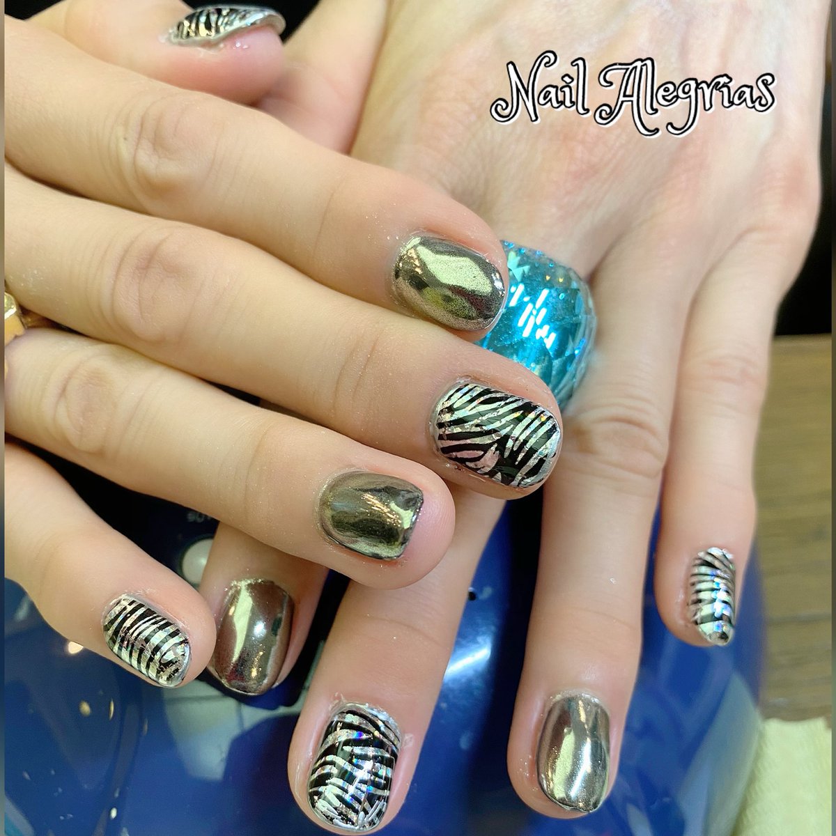 ট ইট র Bailaora Hassie ハッシー オーロラゼブラでハンドとフット ハンドにはミラーシルバー フットはブラック シャープでお洒落に仕上がりました ありがとうございました ネイルアート ネイルデザイン ジェルネイルデザイン シンプルネイル