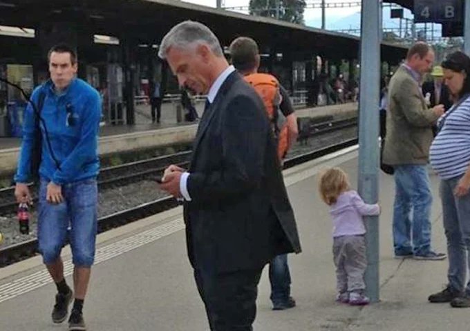 Arrogance doesn't mean snobbery. In Switzerland and the Netherlands, politicians are just normal people. On the left, former Swiss president Burkhalter waiting for his train (while in office). Right, Dutch PM Mark Rutte cycling to work.