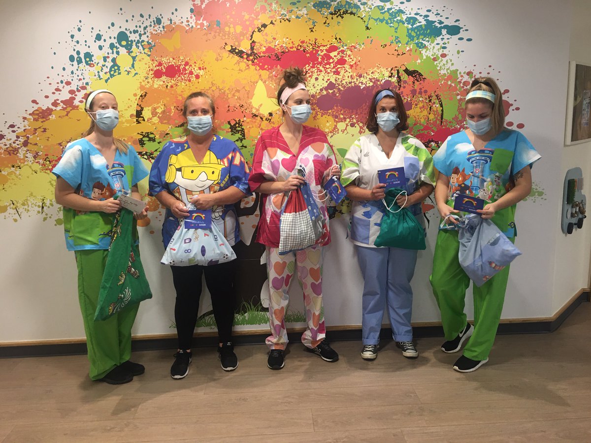 Care staff in their amazing rainbow scrubs - thank you so much to our local group for donating these, along with matching hairbands and even some handcream.