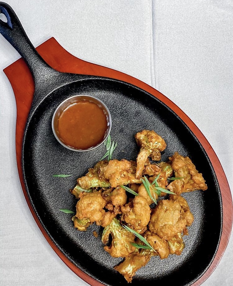 NO WING BUFFALO:::Crispy deep fried cauliflower flower 
African Buffalo sauce. Visit <a href="/ghastro_/">GHastro</a> for your #ghastroexperiece #vegan #glutenfree
