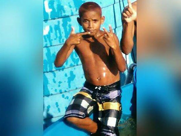 Herinaldo Vinicius de Santana, 11 years old. His last words? "I want my mom". He was going to buy a ping pong ball. He was holding the money on his hands. SAY HIS NAME  #BlackLivesMatter  