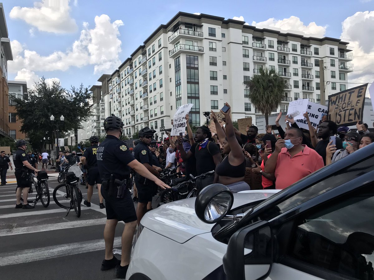 Here’s a photo of the arrest. I just spoke with 2 groups walking toward Colomial who praised the  @OrlandoPolice cops for working with protestors. Nothing else has escalated further so far, some yelled more at cops, there’s a line drawn.