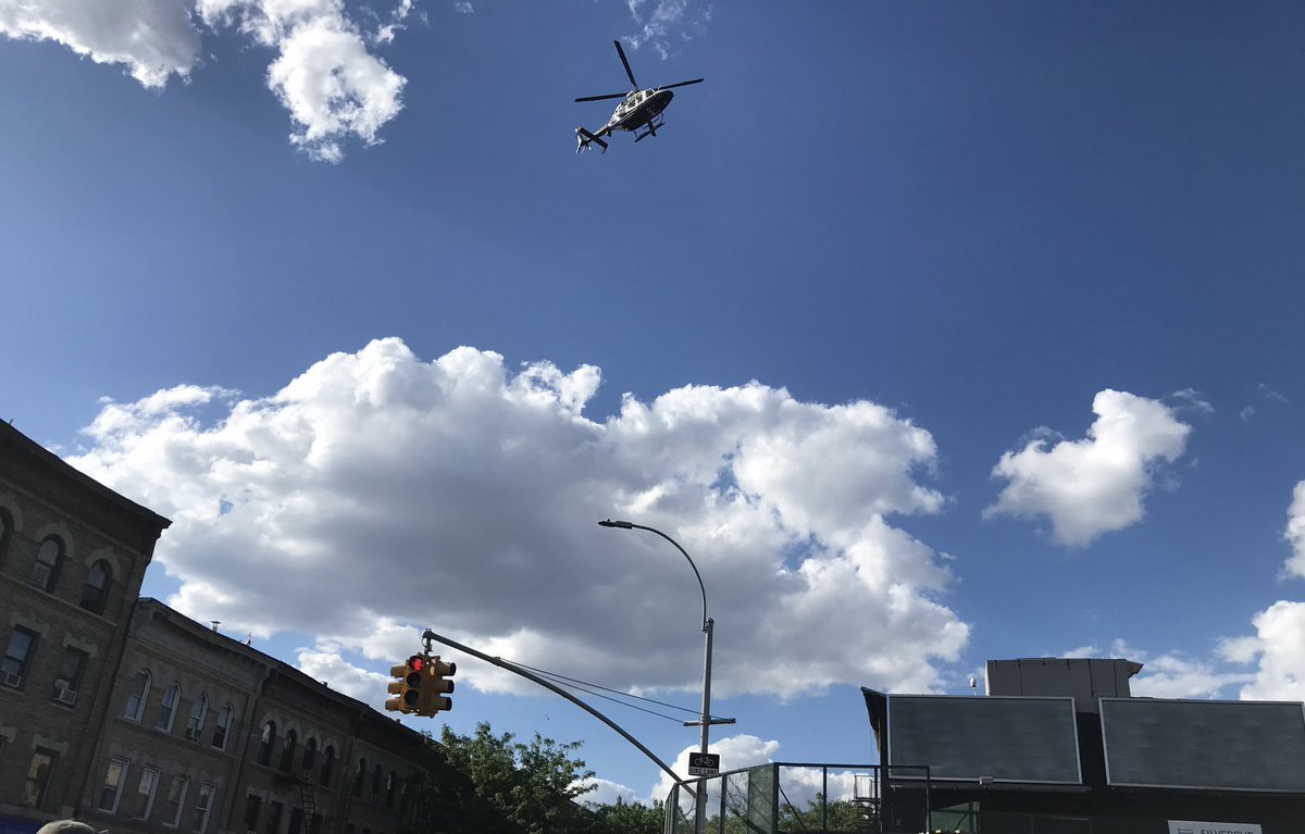 The NYPD helicopter is currently flying at such low altitude that you can’t really hear anything besides the helicopter. Any chants and cheers are being drowned out