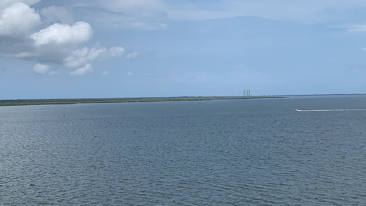 David_E_Harris's tweet photo. Just watched the arm retract live from across the intercoastal in Titusville, FL.   Watched Columbia in ‘81. Can’t wait to watch the birth of another new space program! #LaunchAmerica https://t.co/8r4adnpQAw